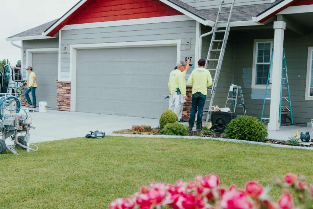 Paintmaster Services team ready to take an exterior painting project